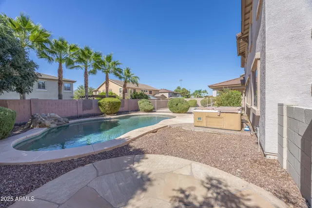 a swimming pool with yard