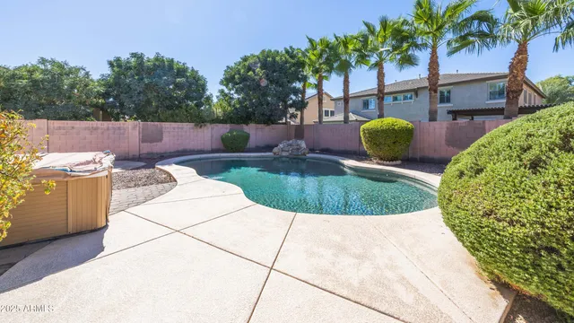 a view of balcony with wooden floor and fence
