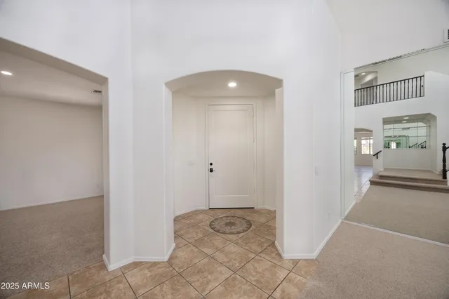 a view of a hallway with staircase