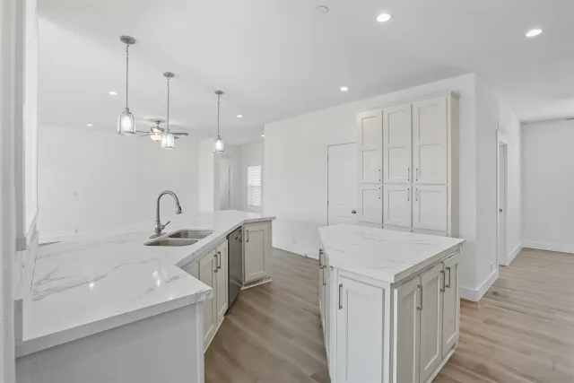 a very nice looking dining room with a table and chairs