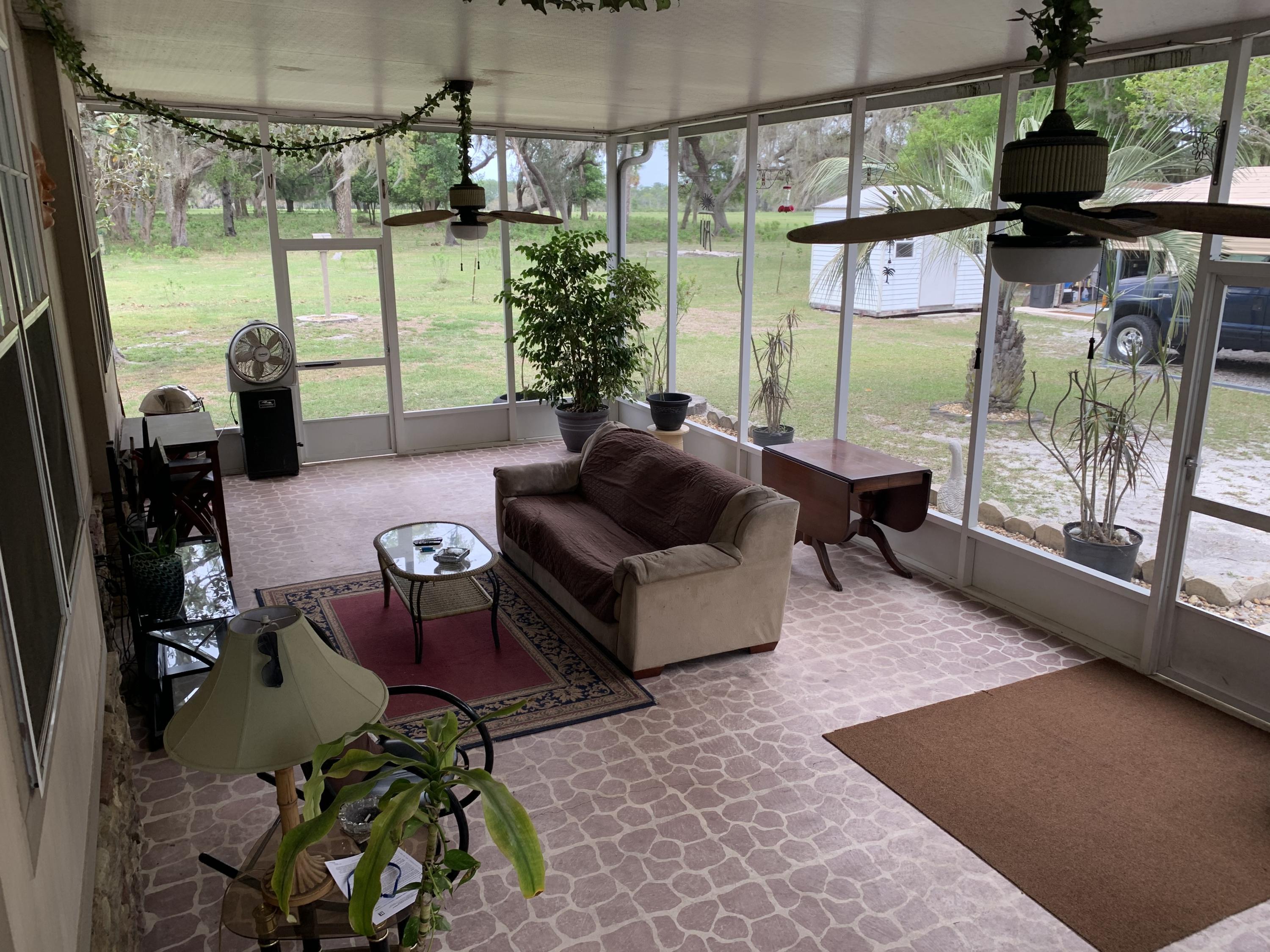 143 Silver Pond Road Crescent City, FL 32112 - Photo 22 of 35 143 Silver Pond- Front Porch