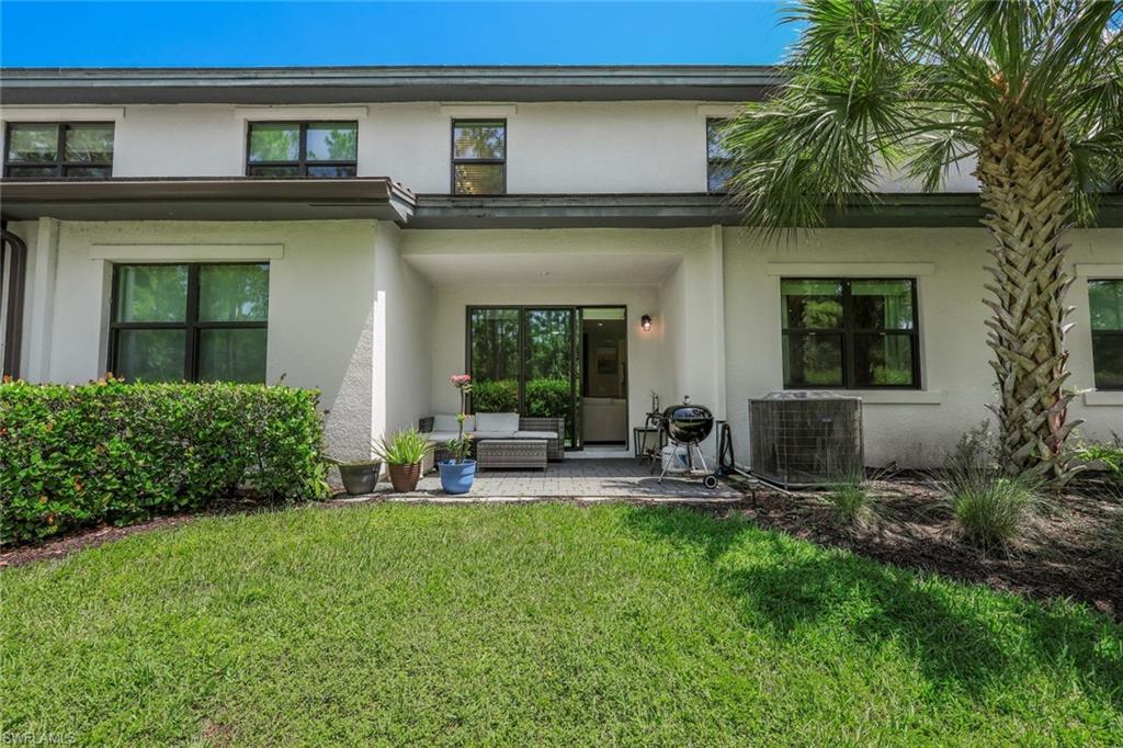 7348 Rockefeller Drive Naples, FL 34119 - Photo 27 of 39 Back of Property