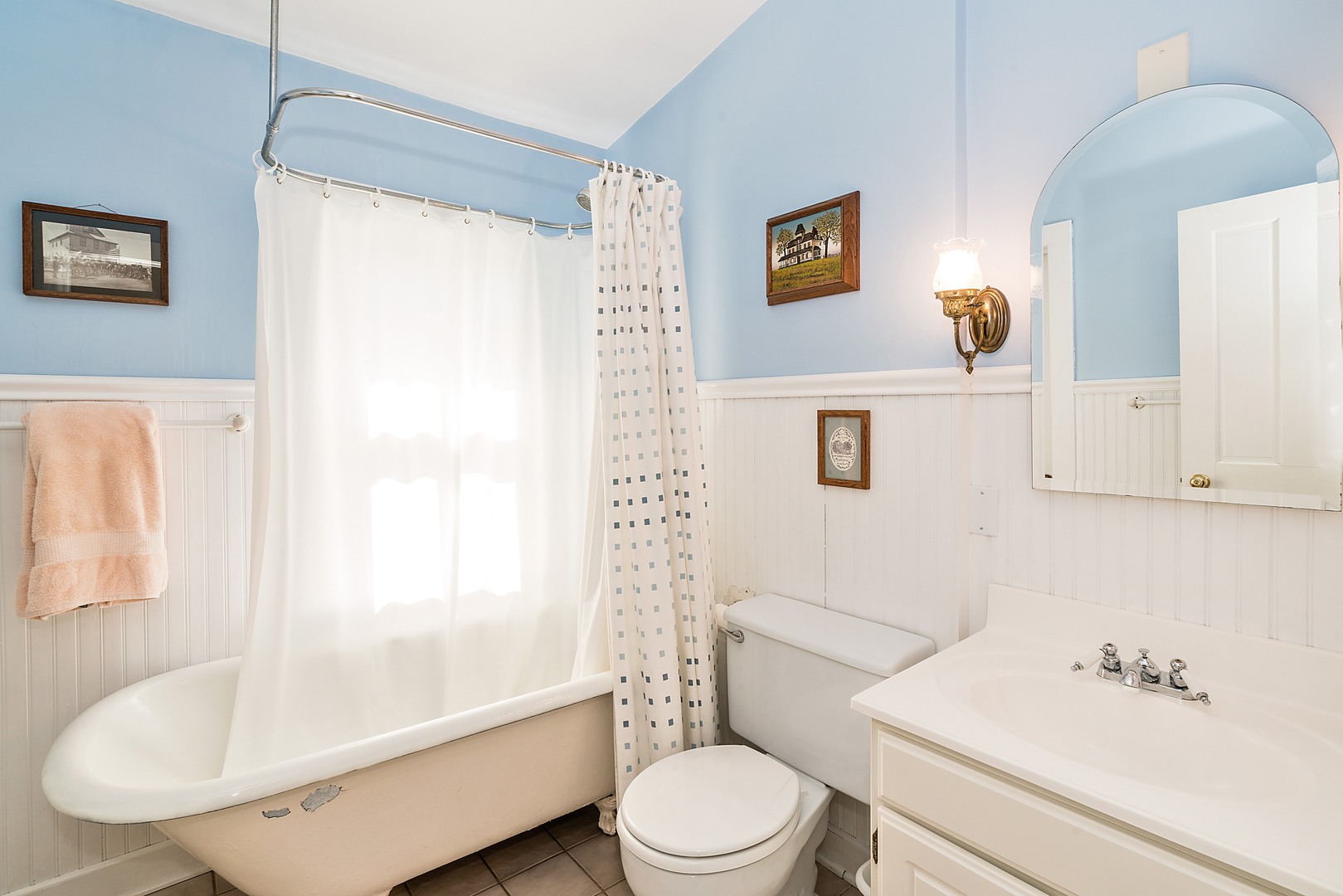 548 Willow Road Winnetka, IL 60093 - Photo 13 of 26 a bathroom with a sink toilet and shower