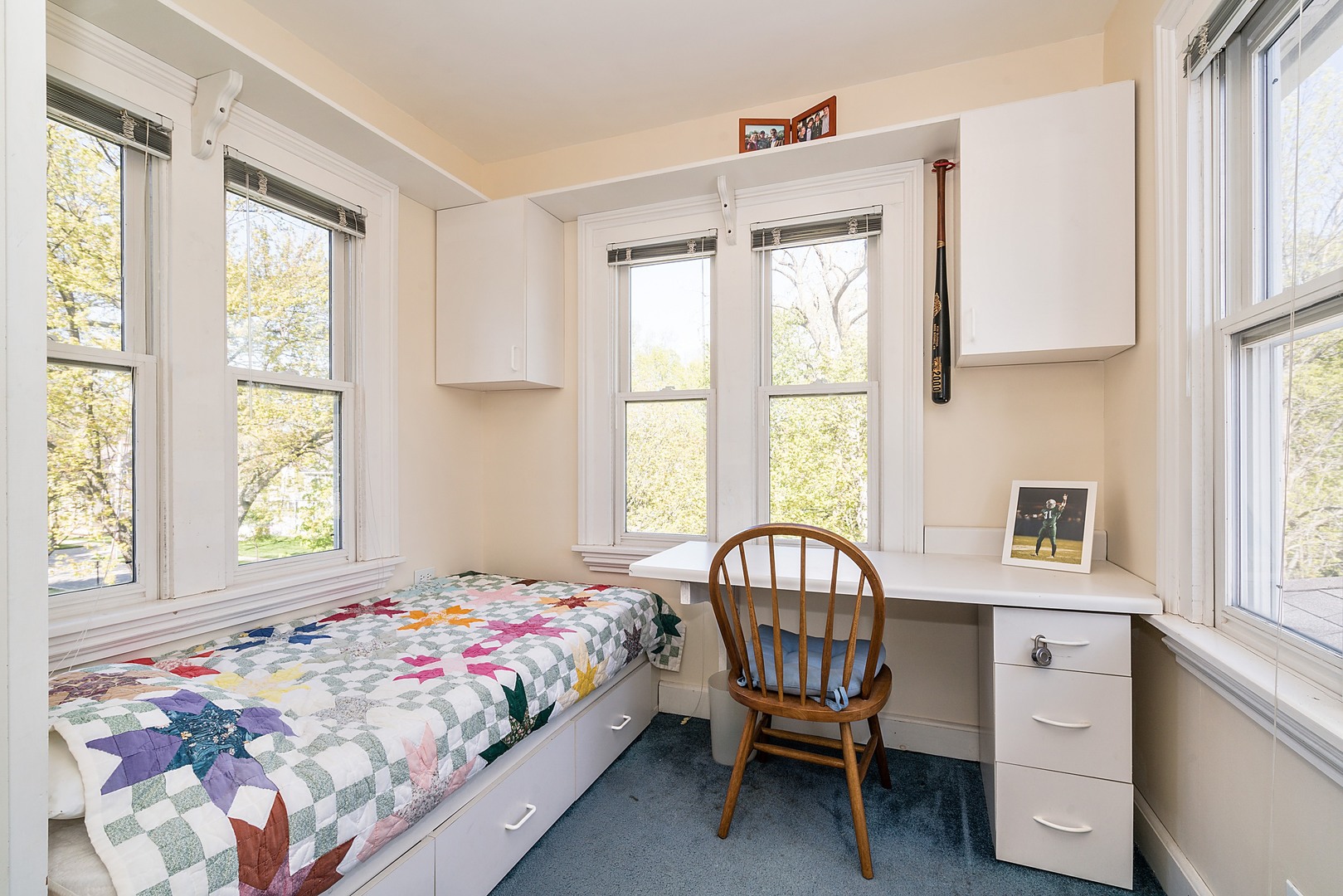 548 Willow Road Winnetka, IL 60093 - Photo 14 of 26 a bedroom with a bed chair and window