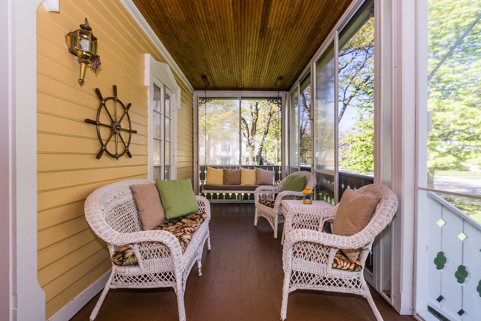 548 Willow Road Winnetka, IL 60093 - Photo 15 of 26 a balcony with wooden floor and furniture