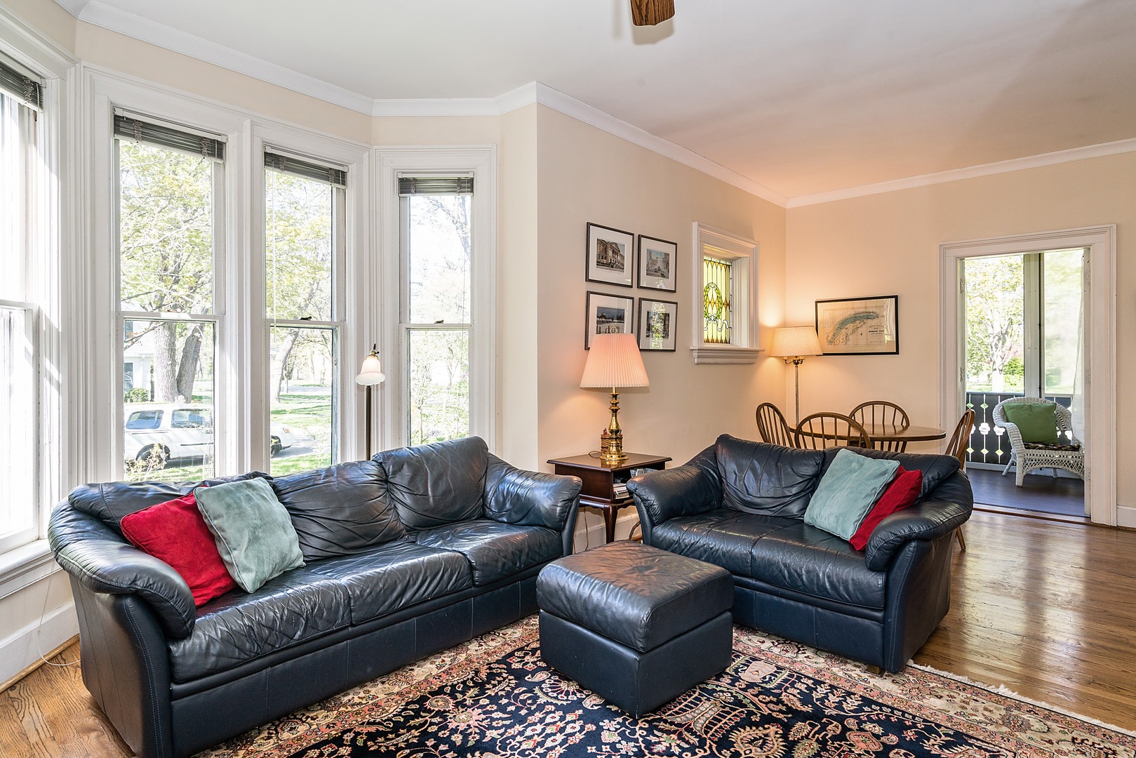 548 Willow Road Winnetka, IL 60093 - Photo 7 of 26 a living room with furniture and a large window