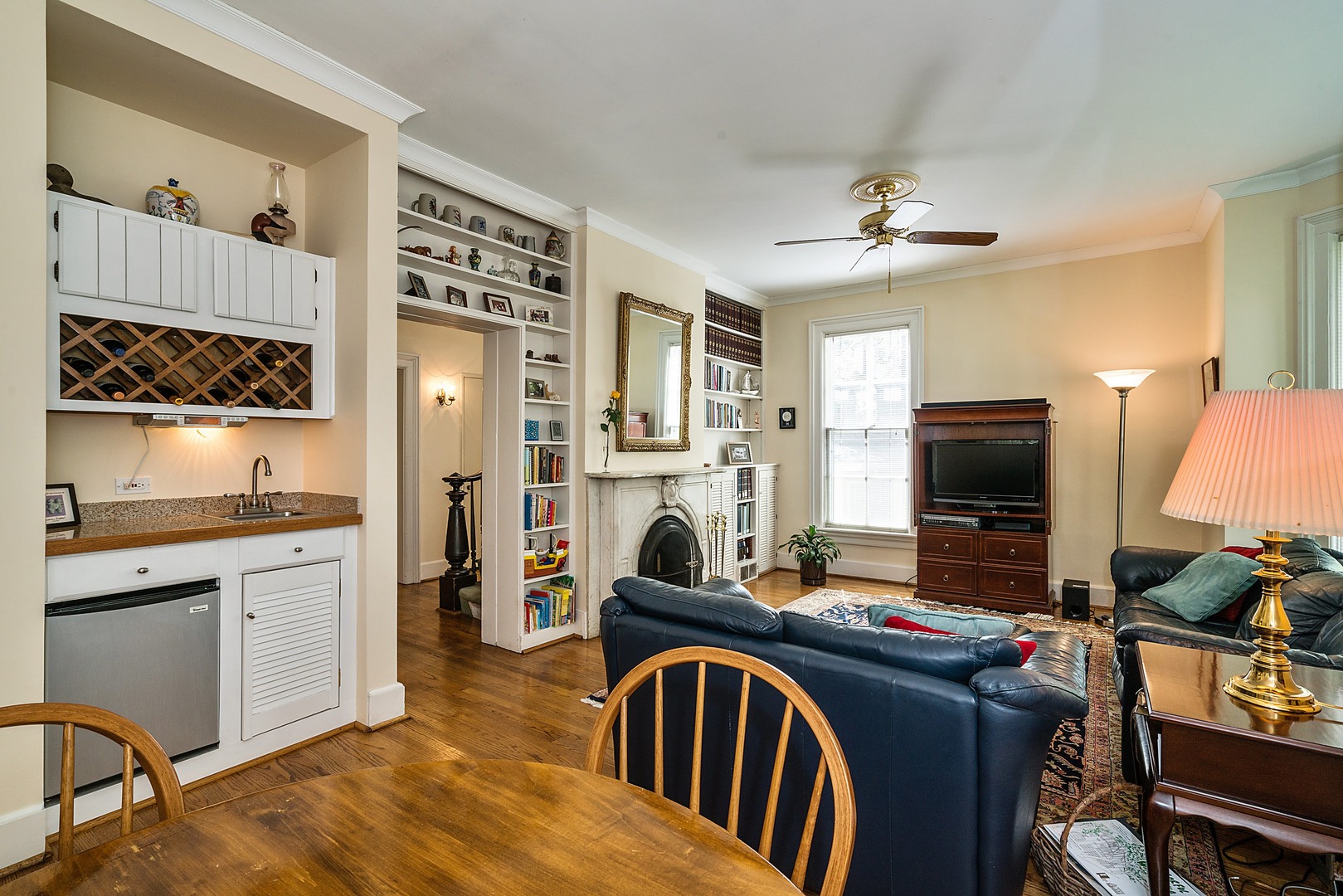 548 Willow Road Winnetka, IL 60093 - Photo 8 of 26 a view of a workspace with furniture and a kitchen