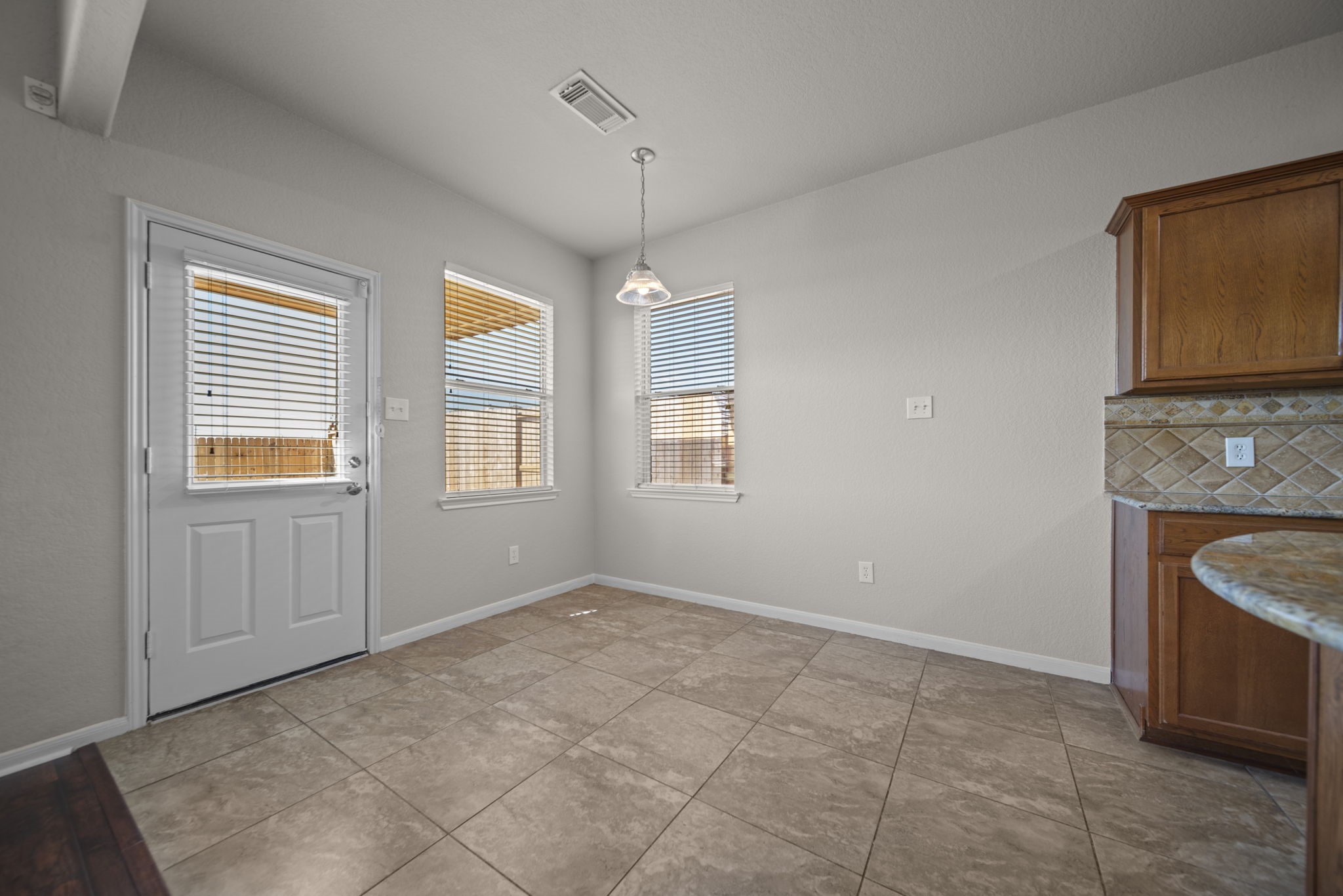 6047 Northcrest Village Way Spring, TX 77388 - Photo 12 of 30 Light & bright breakfast room!