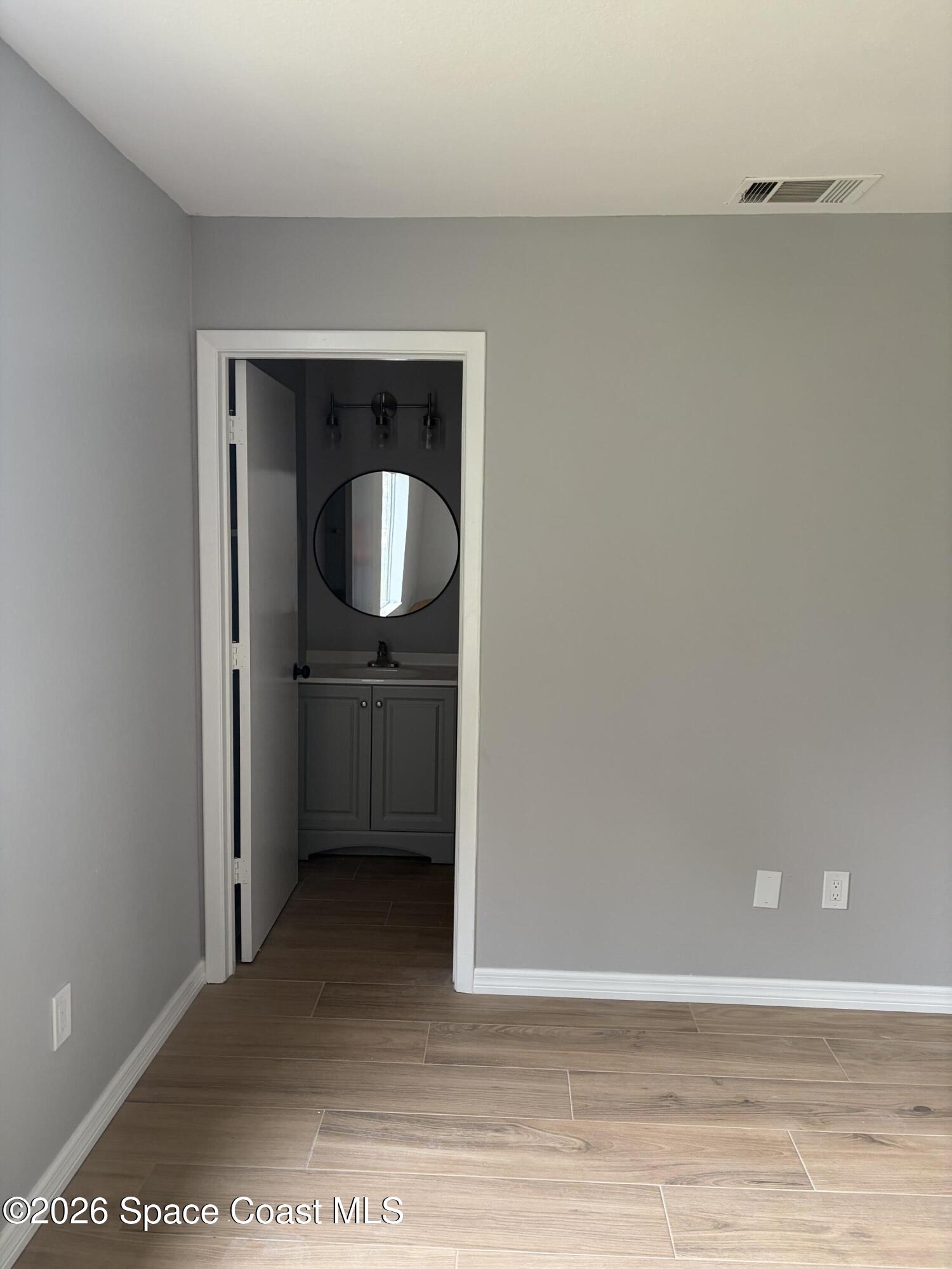 1136 Minnet Court Northeast Palm Bay, FL 32905 - Photo 5 of 31 Primary Bedroom 3