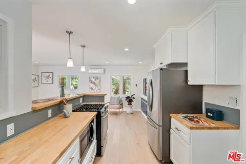 a close view of a utility room with a bathroom