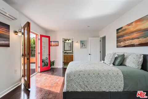 a view of a balcony with trees