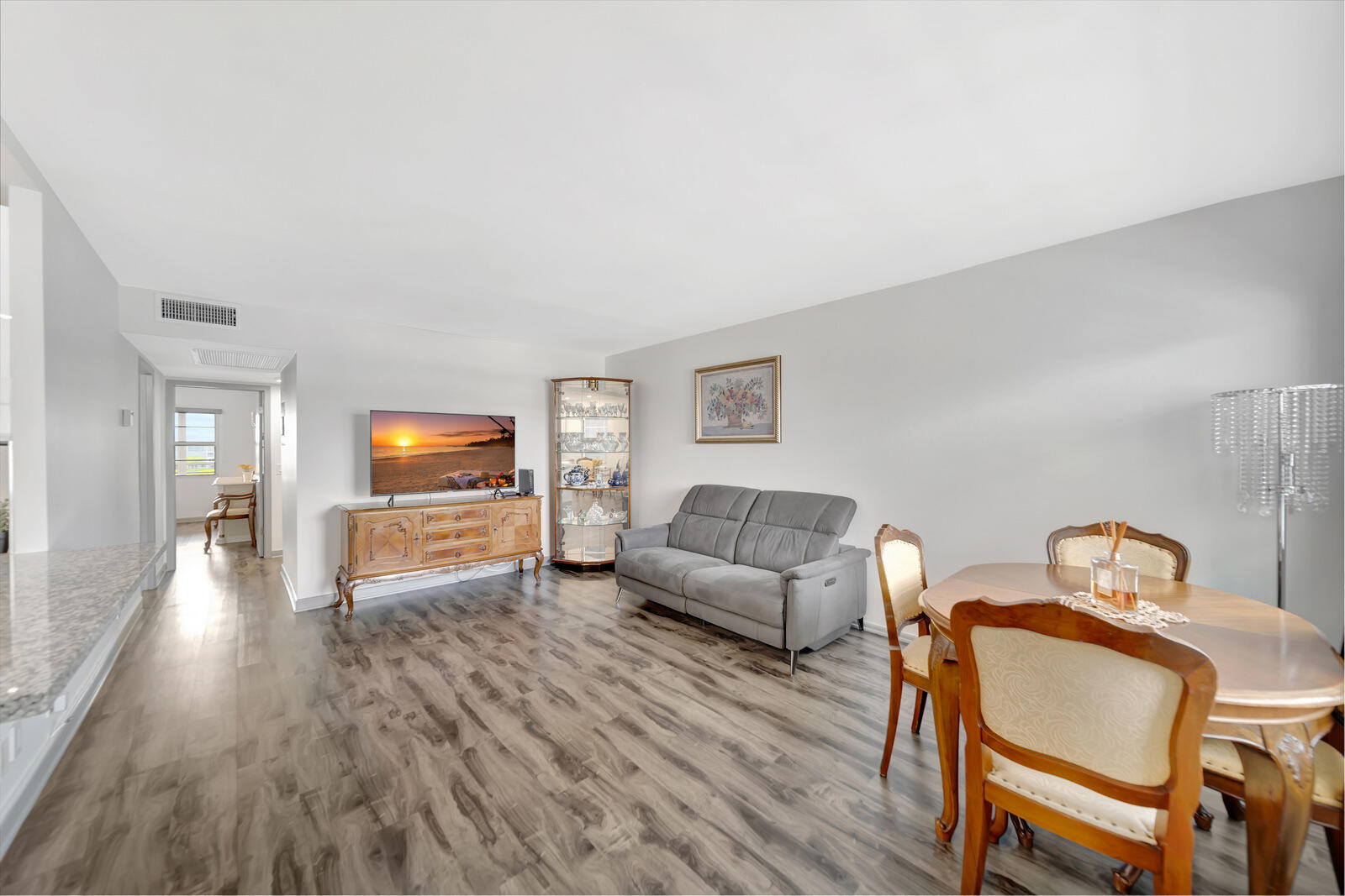 4063 Exeter Boca Raton, FL 33434 - Photo 18 of 55 a living room with furniture and a flat screen tv