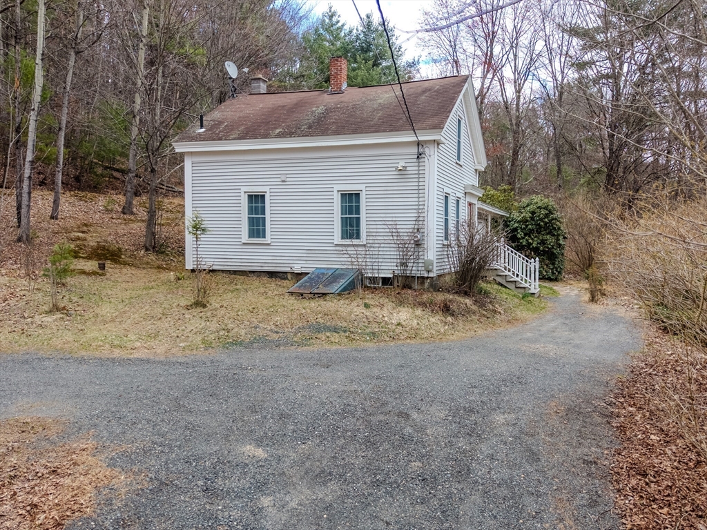 118 North Leverett Road Leverett, MA 01054 - Photo 24 of 26 a view of a house with a yard
