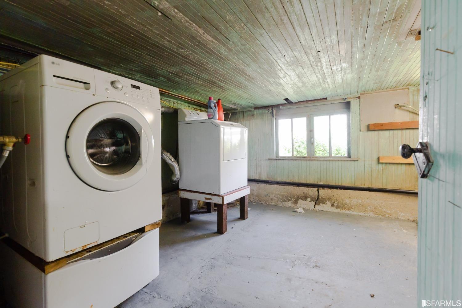 1616 Prince Street Berkeley, CA 94703 - Photo 13 of 20 a view of a hallway with washer and dryer