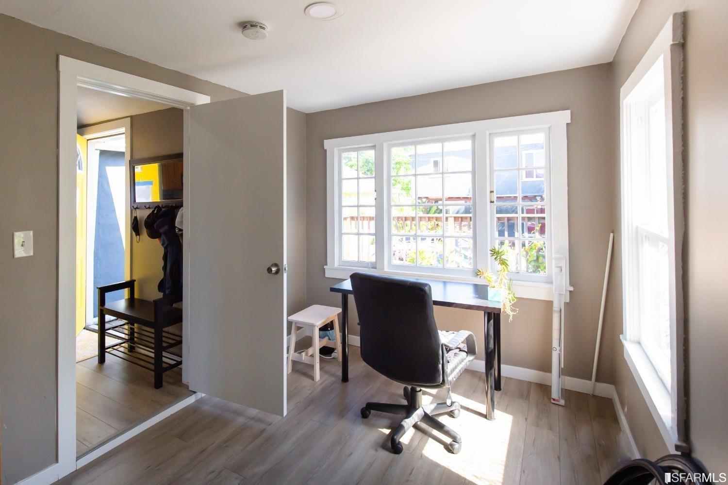 1616 Prince Street Berkeley, CA 94703 - Photo 19 of 20 a view of a workspace with furniture and a window