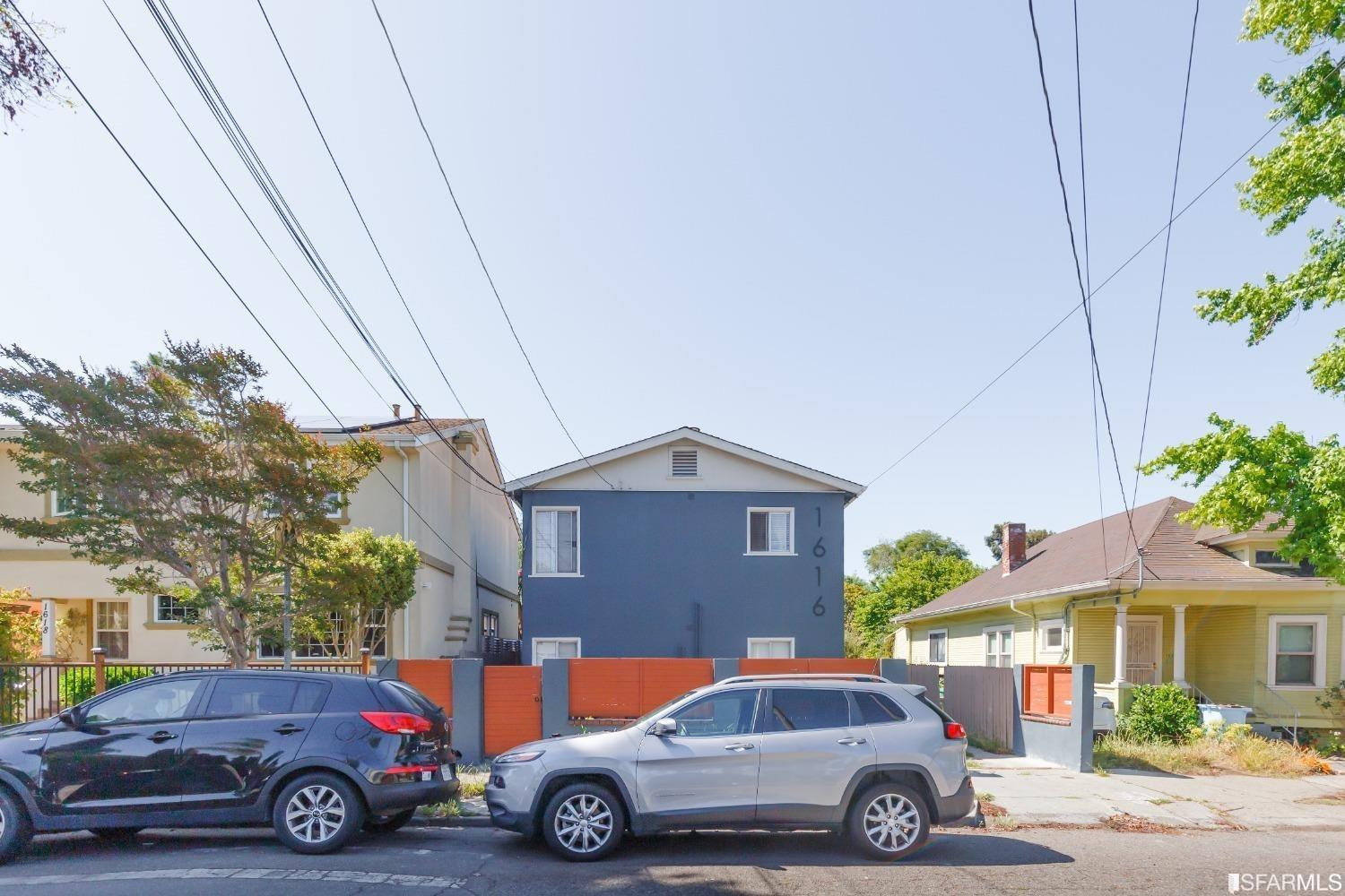 1616 Prince Street Berkeley, CA 94703 - Photo 2 of 20 a car parked in front of a house