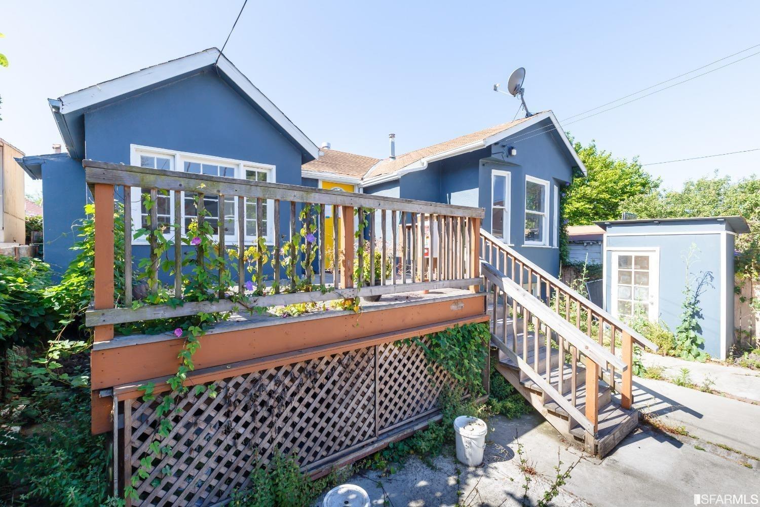 1616 Prince Street Berkeley, CA 94703 - Photo 4 of 20 a front view of a house with a deck