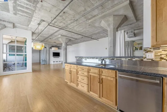 a view of livingroom with furniture wooden floor and windows