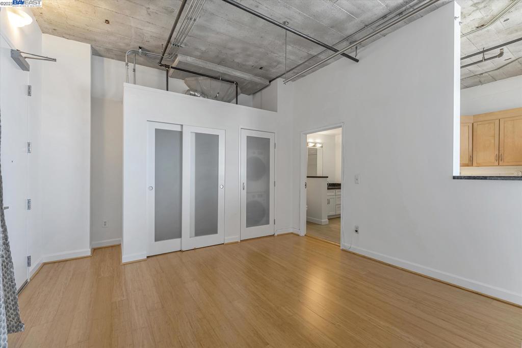 737 2nd Street, Unit 310 Oakland, CA 94607 - Photo 23 of 29 a view of a big room with wooden floor and windows