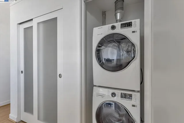 a bathroom with a granite countertop toilet a sink and bathtub