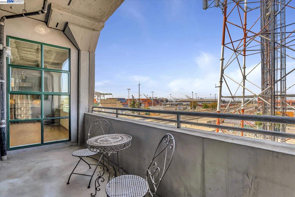 737 2nd Street, Unit 310 Oakland, CA 94607 - Photo 27 of 29 a view of a chairs and table in the balcony
