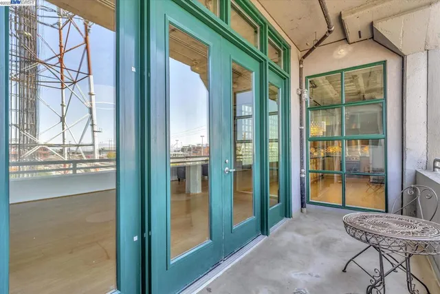 a table and chairs in front of a house