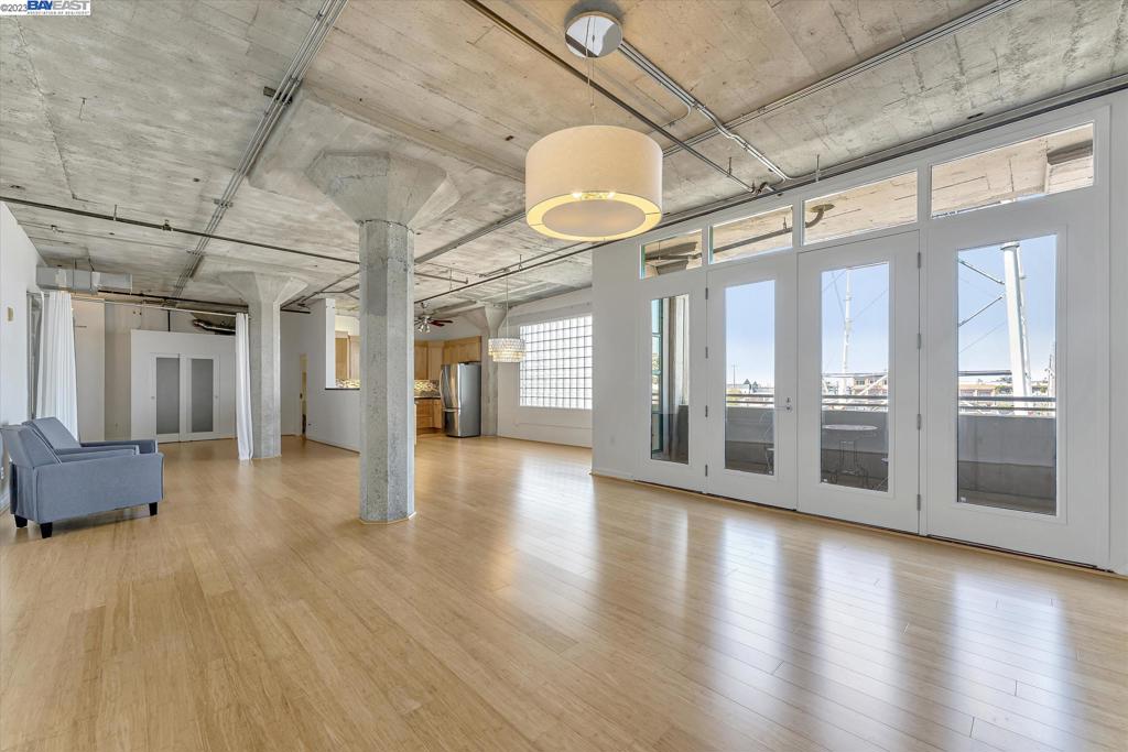 737 2nd Street, Unit 310 Oakland, CA 94607 - Photo 6 of 29 a view of an entryway with wooden floor and windows