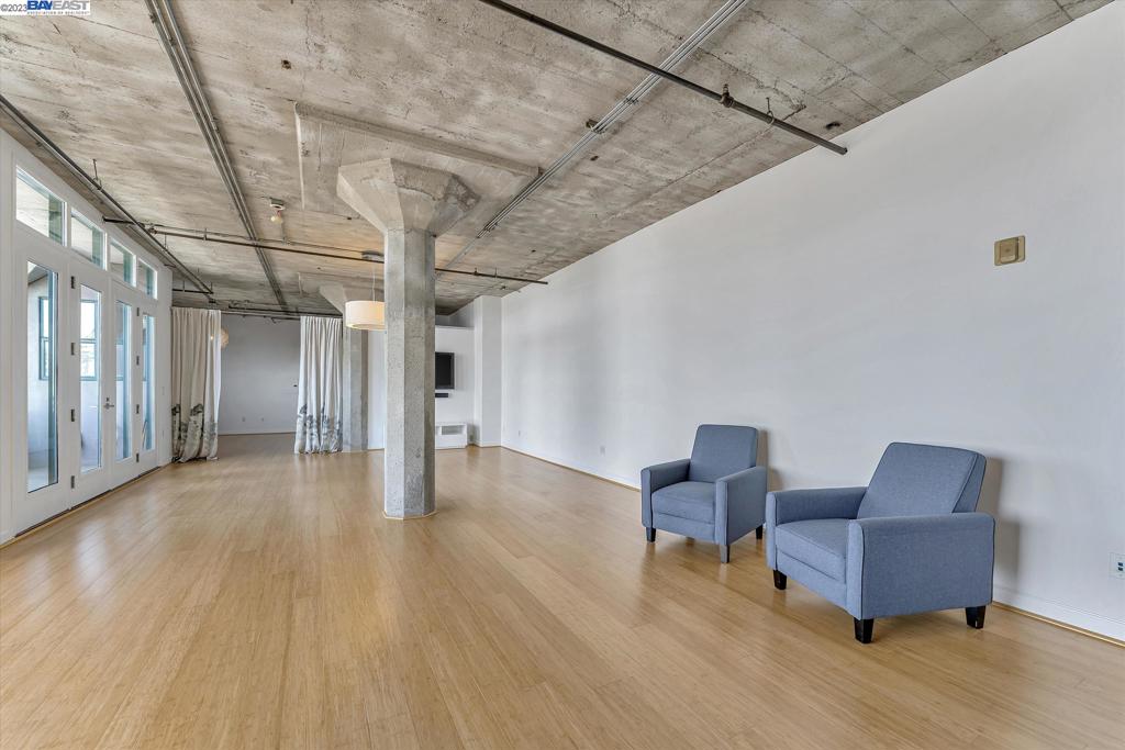 737 2nd Street, Unit 310 Oakland, CA 94607 - Photo 7 of 29 a view of livingroom with furniture and wooden floor