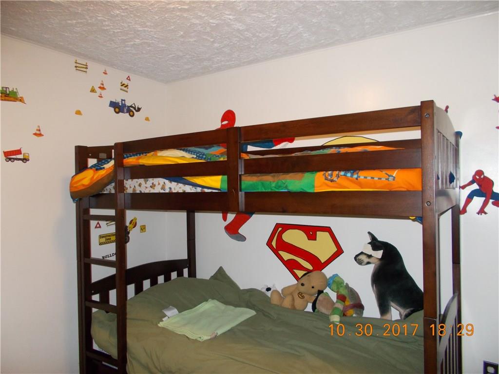 547 Pollock Store Road Volant, PA 16156 - Photo 11 of 13 2nd bedroom w/bunk beds that will remain with home.