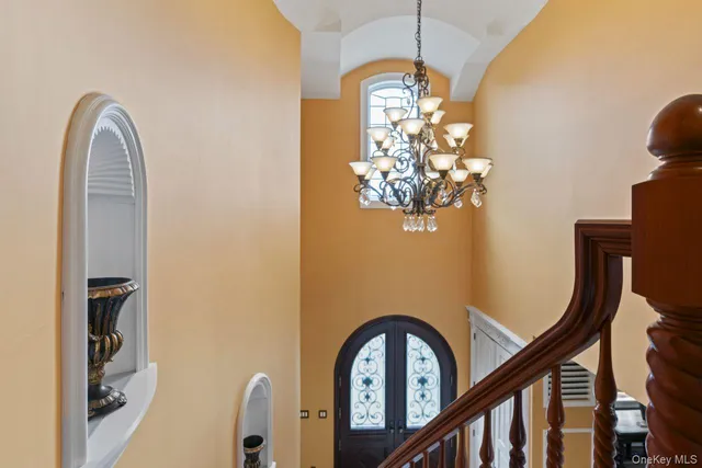 a view of a livingroom with furniture and chandelier