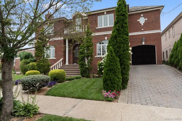 a view of a house with a garden