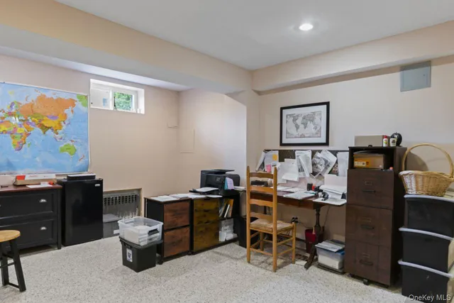 a view of a workspace with furniture