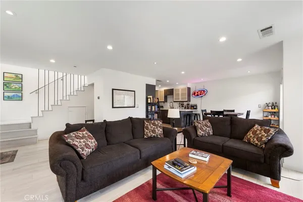 a living room with furniture and a couch