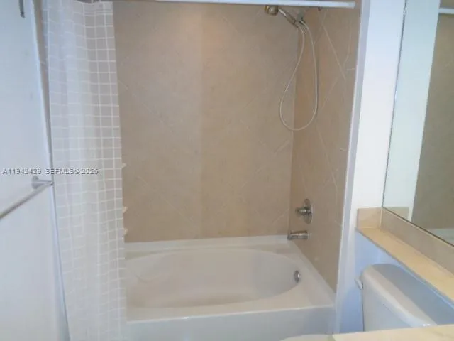 a view of swimming pool from a balcony