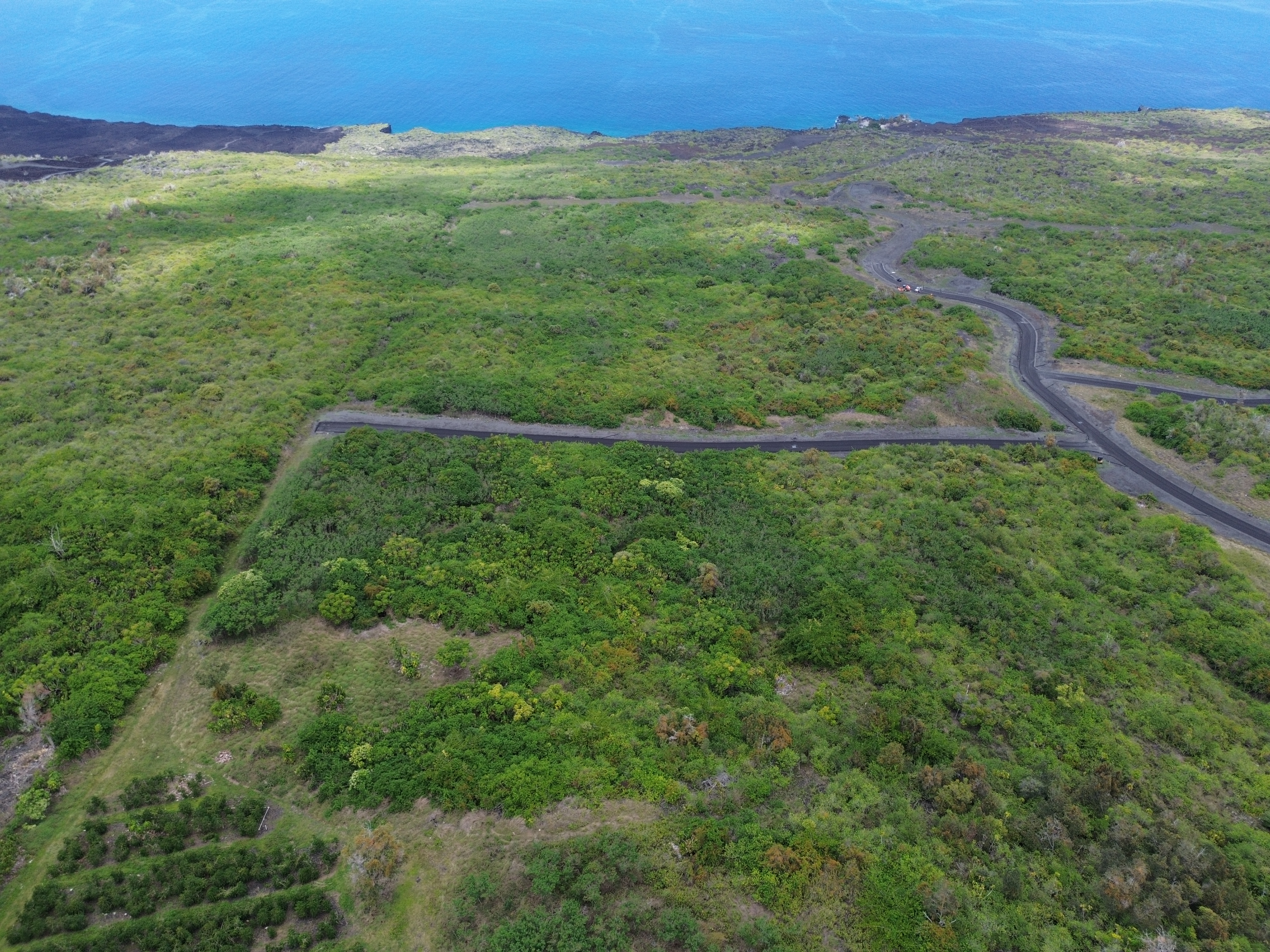 87-1815 Lot 17 Opihihale Street Captain Cook, HI 96704 - Photo 2 of 8 a view of a green field with lots of bushes