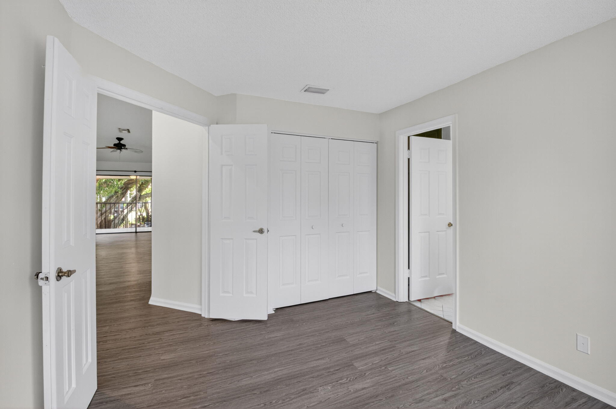 5530 Coach House Circle, Unit E Boca Raton, FL 33486 - Photo 19 of 40 a view of a room with wooden floor