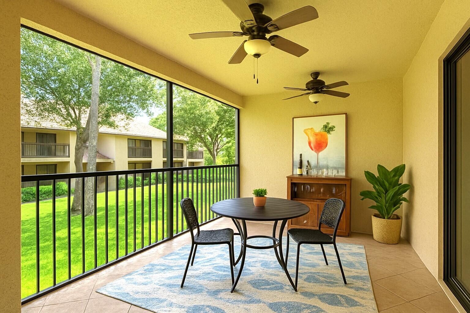 5530 Coach House Circle, Unit E Boca Raton, FL 33486 - Photo 25 of 40 a view of a porch with furniture and garden