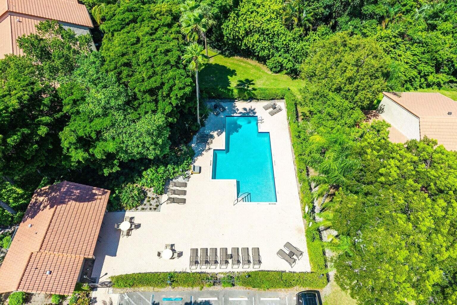 5530 Coach House Circle, Unit E Boca Raton, FL 33486 - Photo 33 of 40 an aerial view of a house with a yard basket ball court and outdoor seating