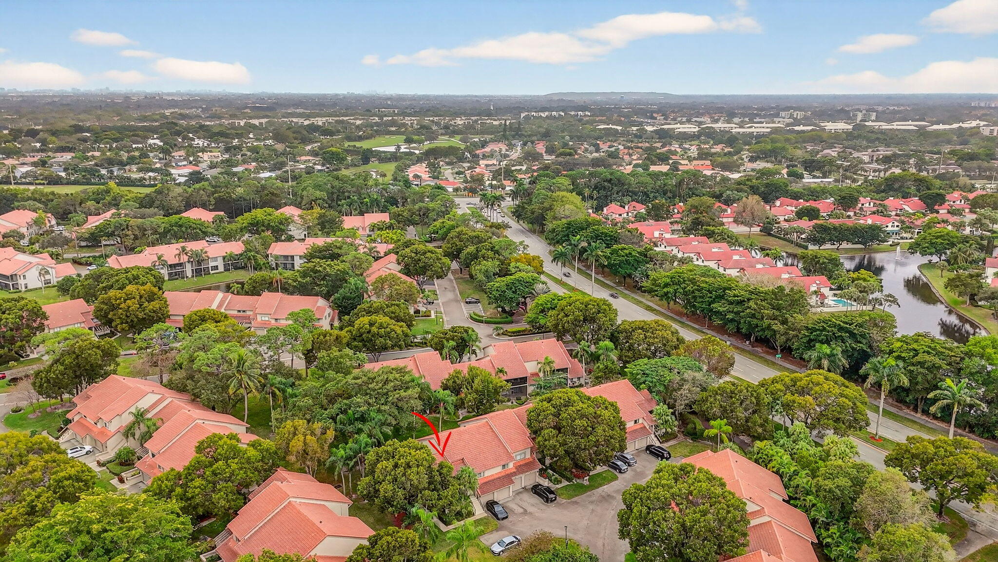 5530 Coach House Circle, Unit E Boca Raton, FL 33486 - Photo 38 of 40 an aerial view of residential houses with outdoor space