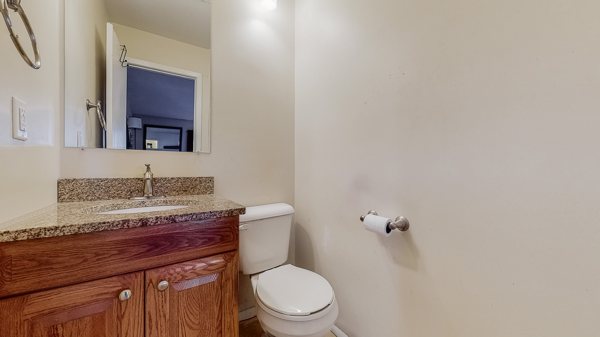 34 Aldon Road Montgomery, IL 60538 - Photo 12 of 20 a bathroom with a granite countertop toilet sink and mirror