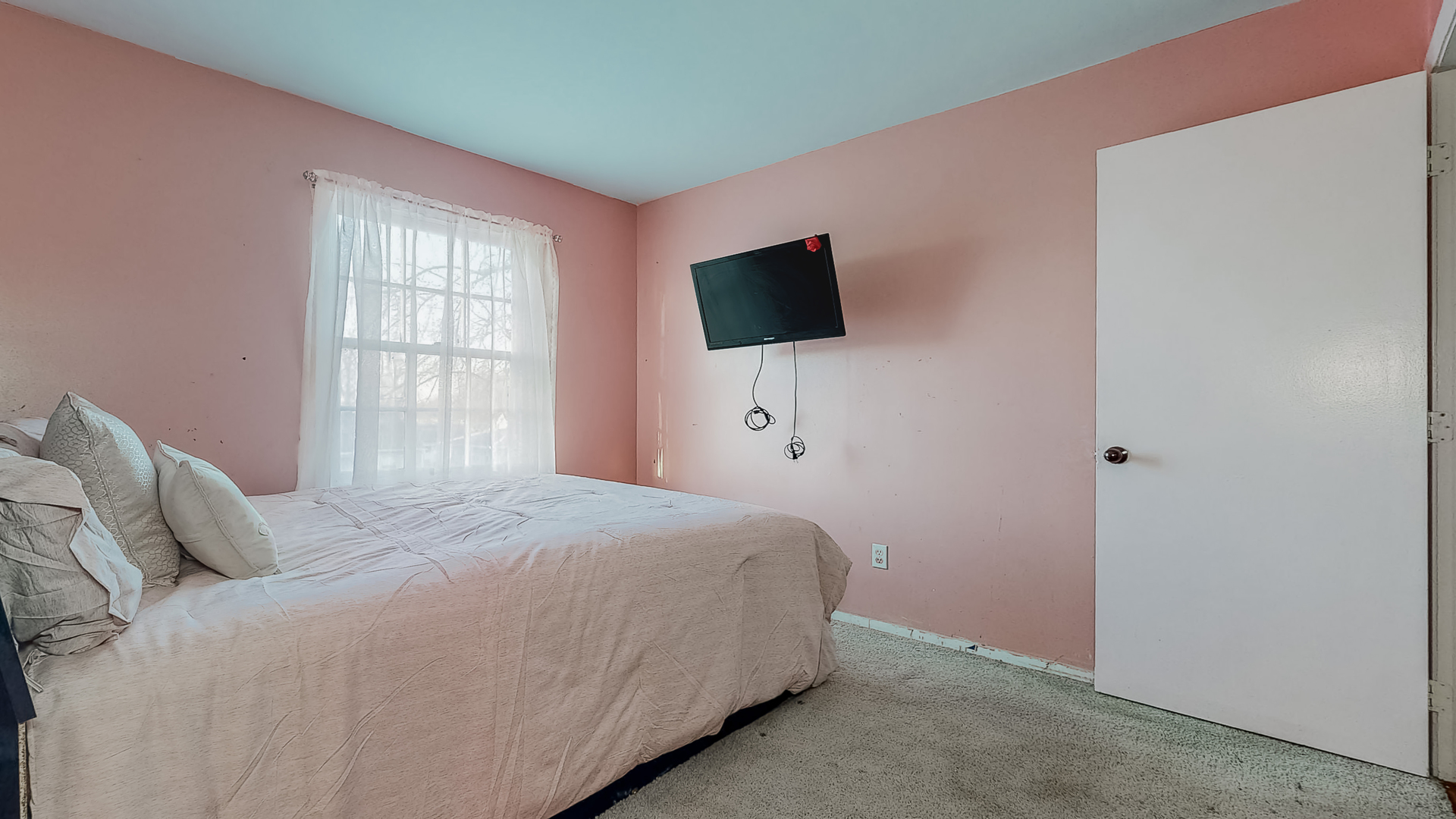 34 Aldon Road Montgomery, IL 60538 - Photo 15 of 20 a bedroom with a bed and a flat screen tv
