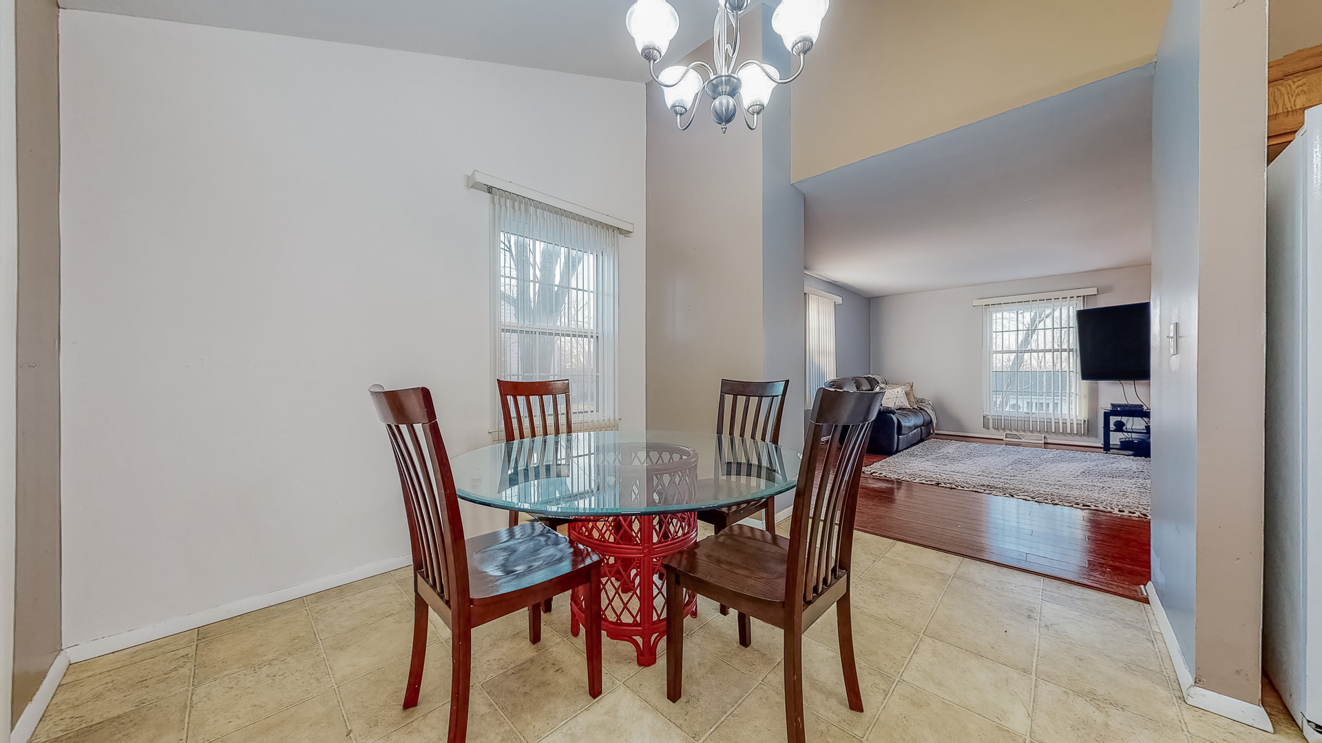 34 Aldon Road Montgomery, IL 60538 - Photo 5 of 20 a dining room with furniture a chandelier and window