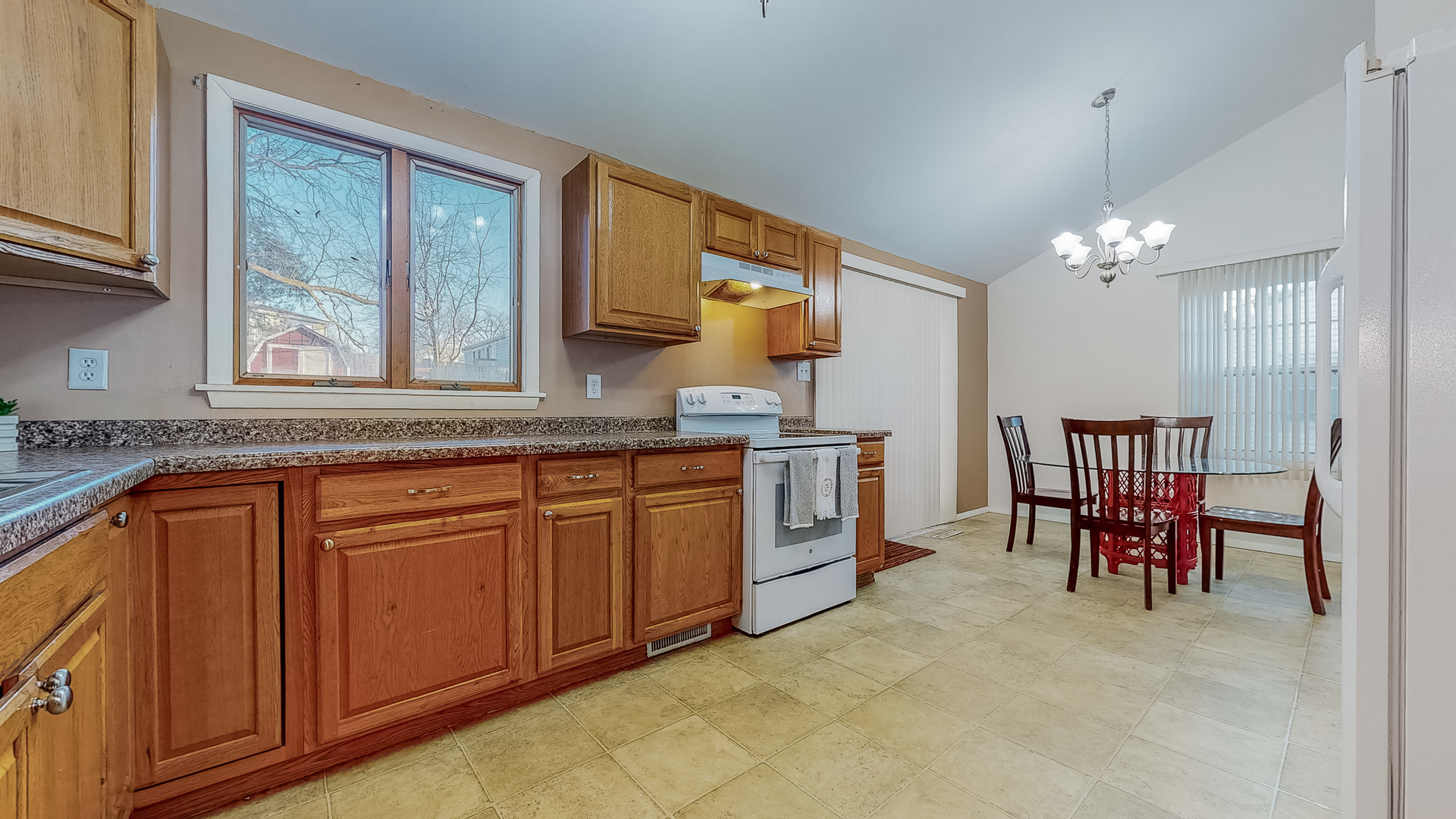 34 Aldon Road Montgomery, IL 60538 - Photo 6 of 20 a kitchen with cabinets and chairs