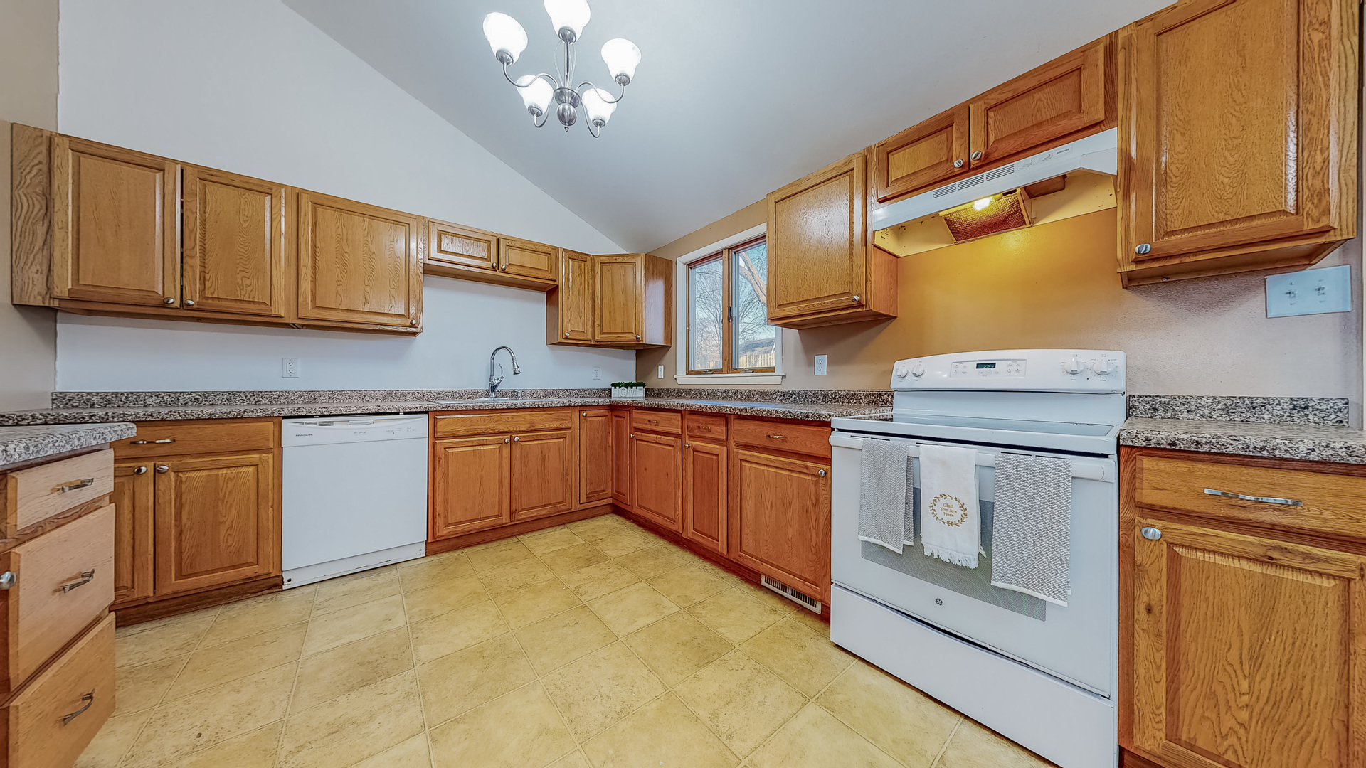 34 Aldon Road Montgomery, IL 60538 - Photo 8 of 20 a kitchen with a stove sink and cabinets