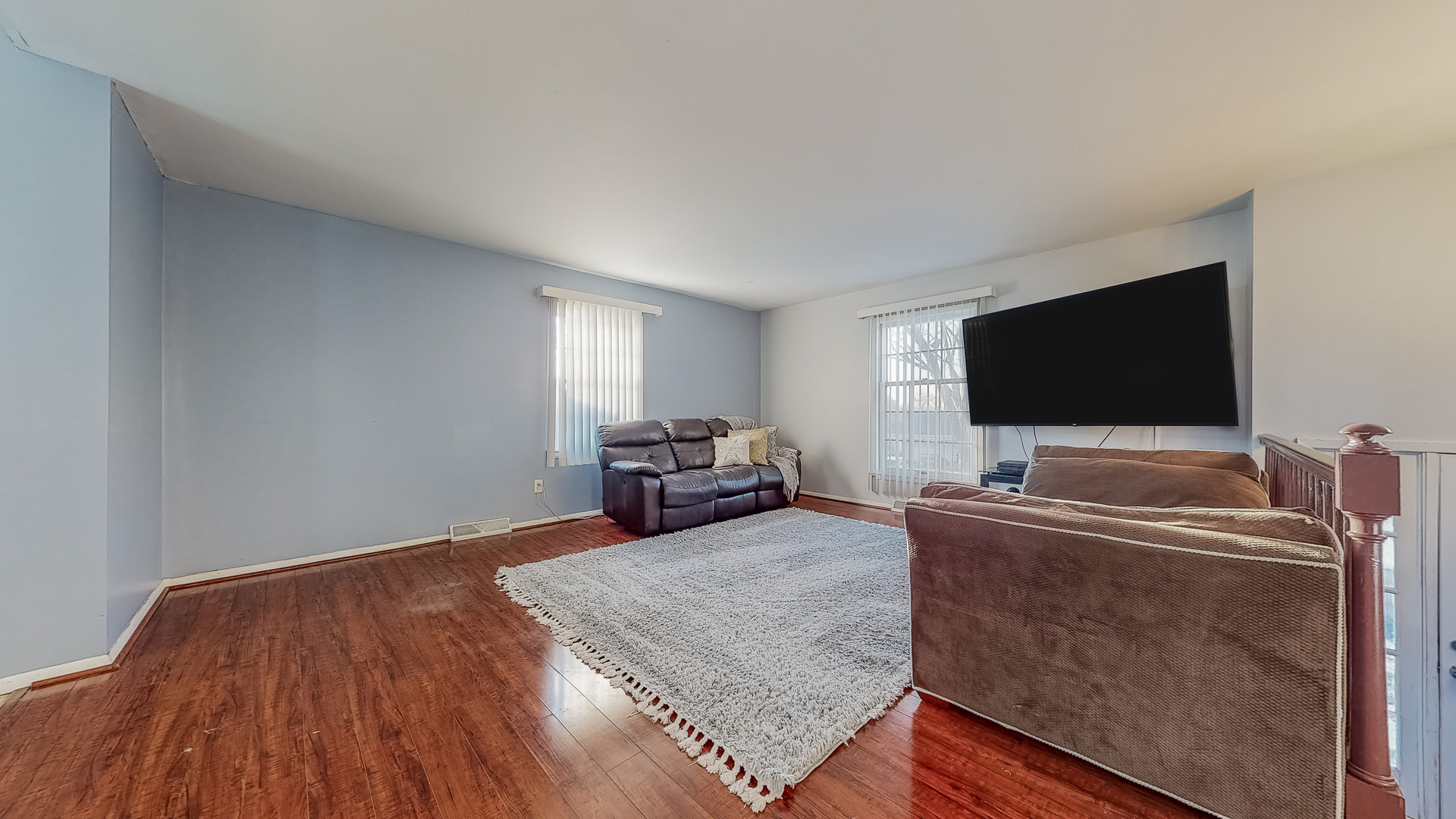 34 Aldon Road Montgomery, IL 60538 - Photo 10 of 20 a living room with furniture and a flat screen tv