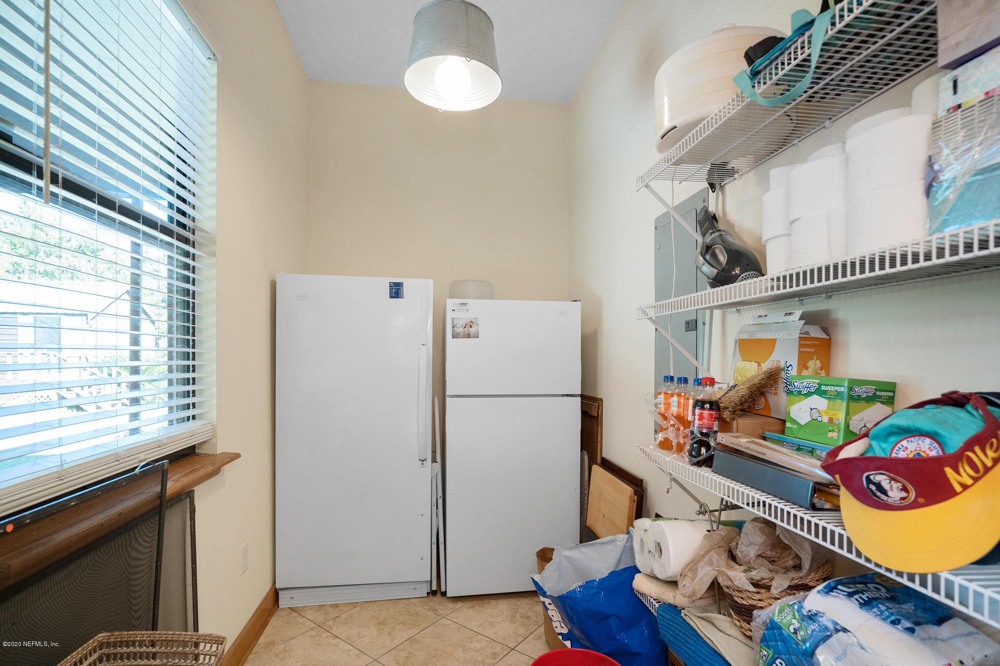 13385 Sawpit Road Jacksonville, FL 32226 - Photo 53 of 80 a white refrigerator freezer sitting inside of a kitchen
