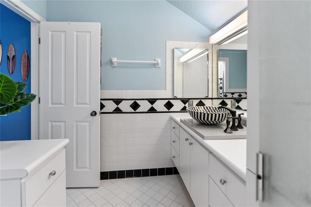 861 Nectar Road Venice, FL 34293 - Photo 45 of 74 a kitchen with a sink and cabinets