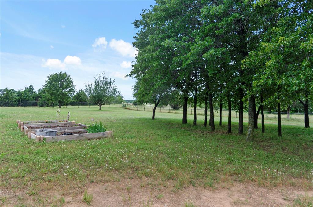 6093 Farm To Market Road 730 North Decatur, TX 76234 - Photo 26 of 28 a view of outdoor space with deck and trees