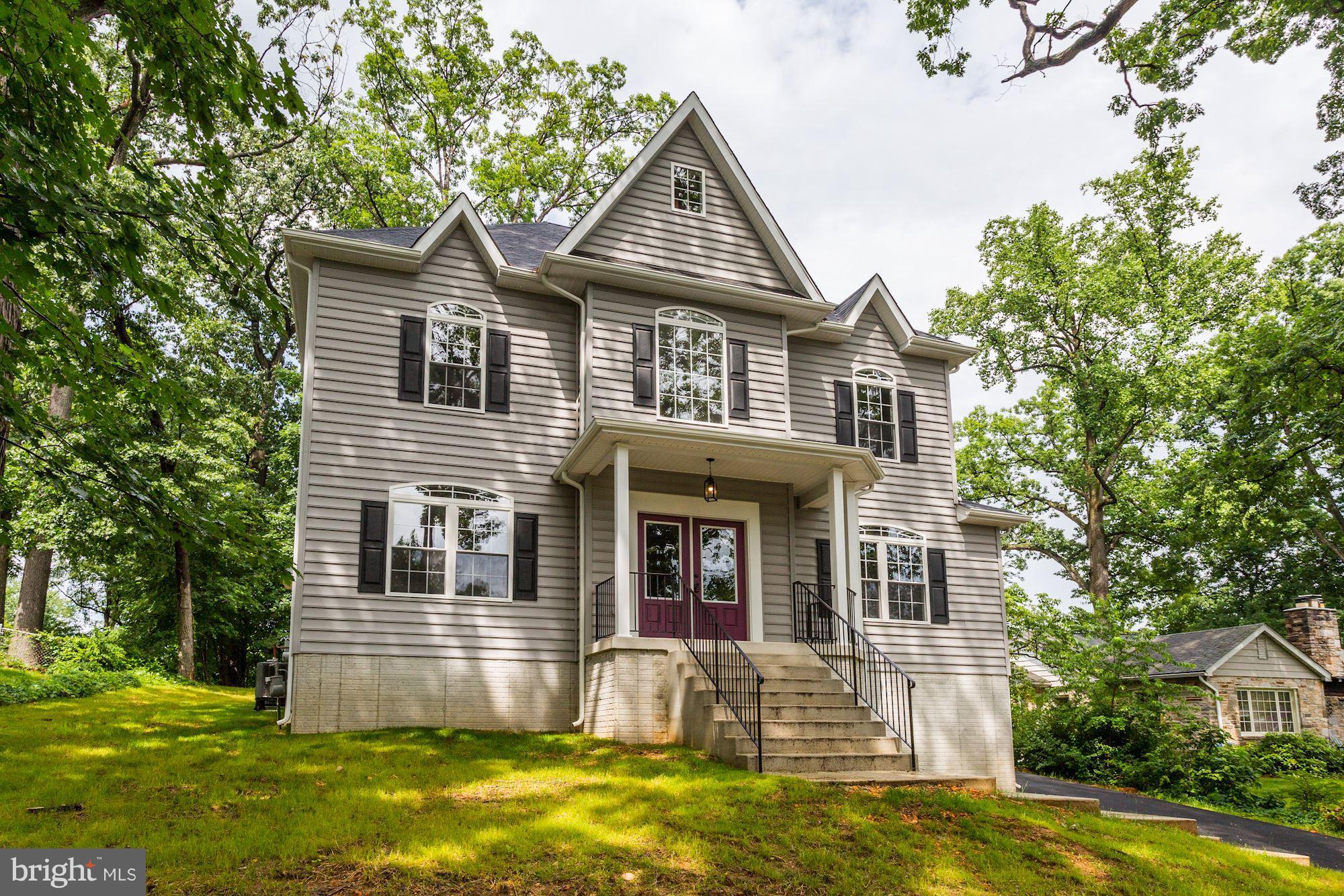 507 South Rolling Road Baltimore, MD 21228 - Photo 1 of 30 a front view of a house with a yard