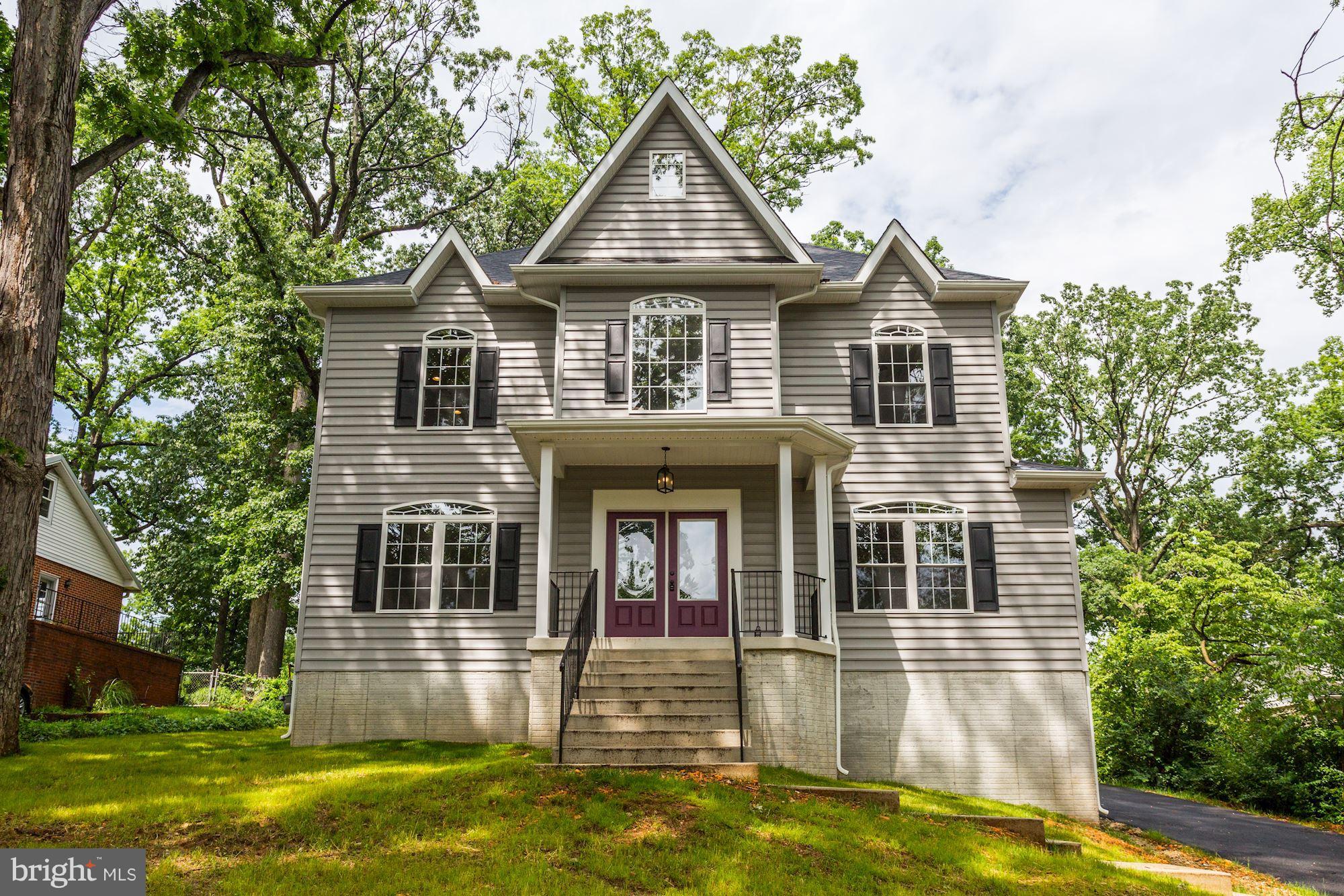 507 South Rolling Road Baltimore, MD 21228 - Photo 2 of 30 front view of a house with a yard